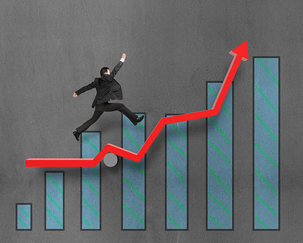 istock Businessman running and jumping on growth red arrow with chart 454991247