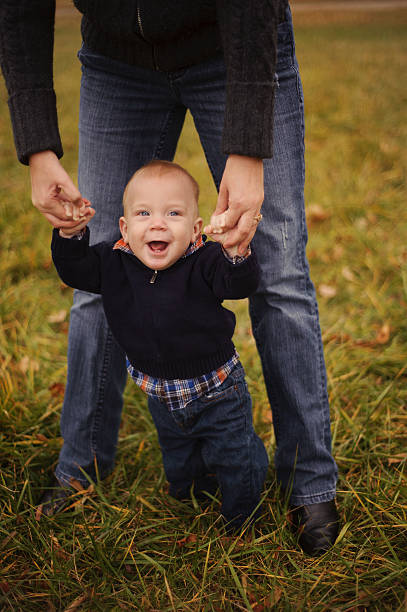 istock Mother Holding Baby Boy 454994105