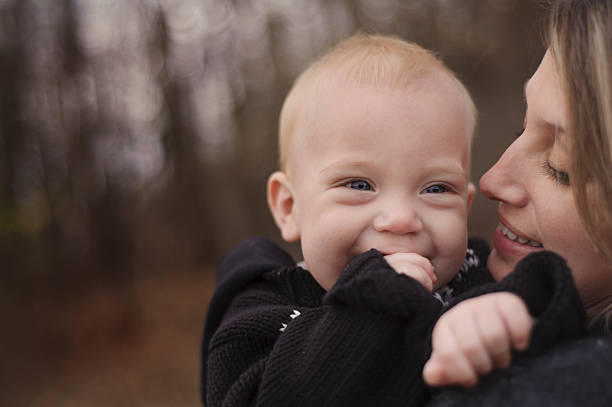 istock Mother Kissing Son 454994129