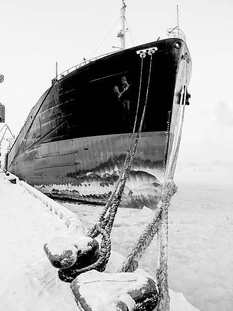 Ship on the Frosted Sea at St Petersburg Port with ropes