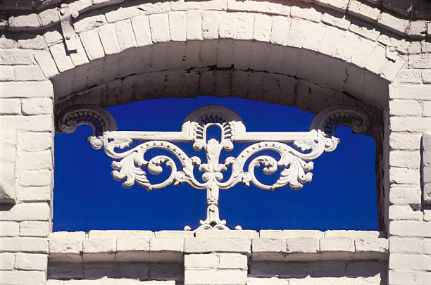 Architectural detail above the cornice of  building.