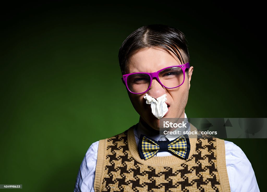 nerd con tejido en la nariz - Foto de stock de Diversión libre de derechos