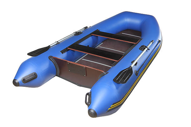 istock Blue inflatable boat with oars, plywood deck and seats. 455012063
