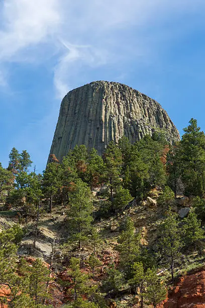 A rock formation on top of a hill.