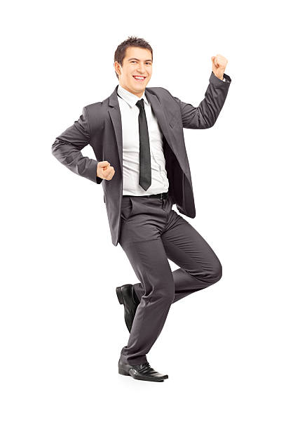 istock Happy young businessman gesturing happiness 455012947