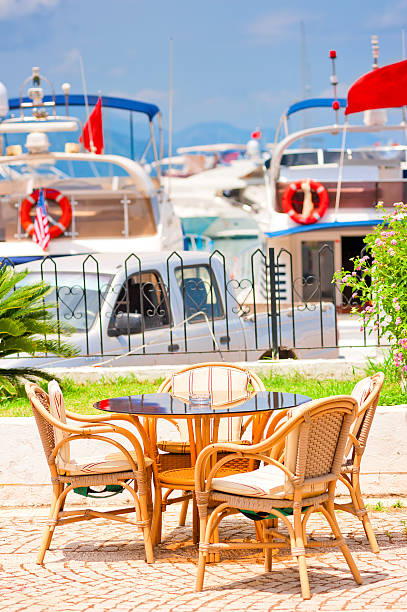 istock table against the background of yacht harbor 455022717