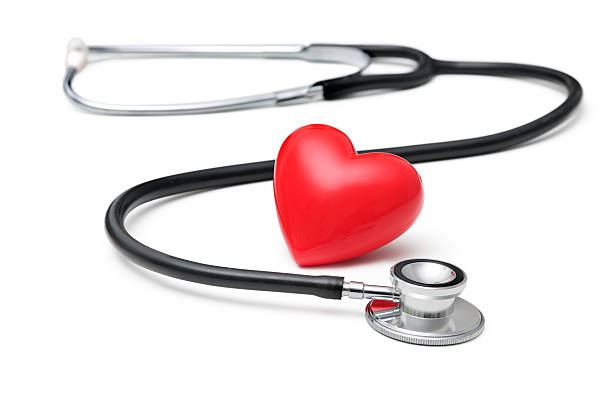 сердце стетоскопом, - equipment listening red stethoscope стоковые фото и изображения