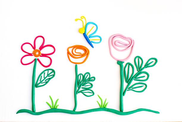 flowers and butterfly which are moulded from plasticine