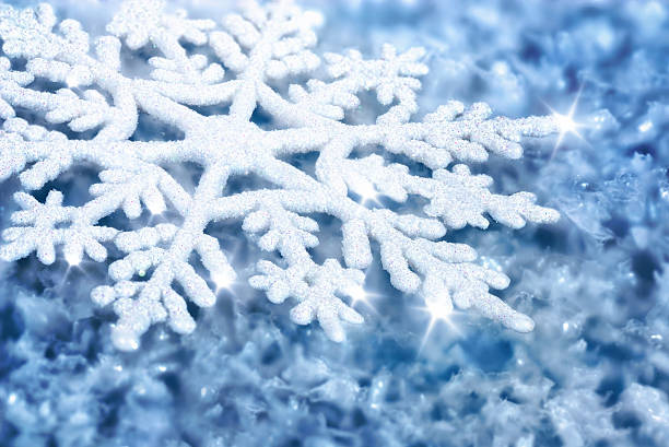 istock Blue background with ice and a large snowflake 455033531