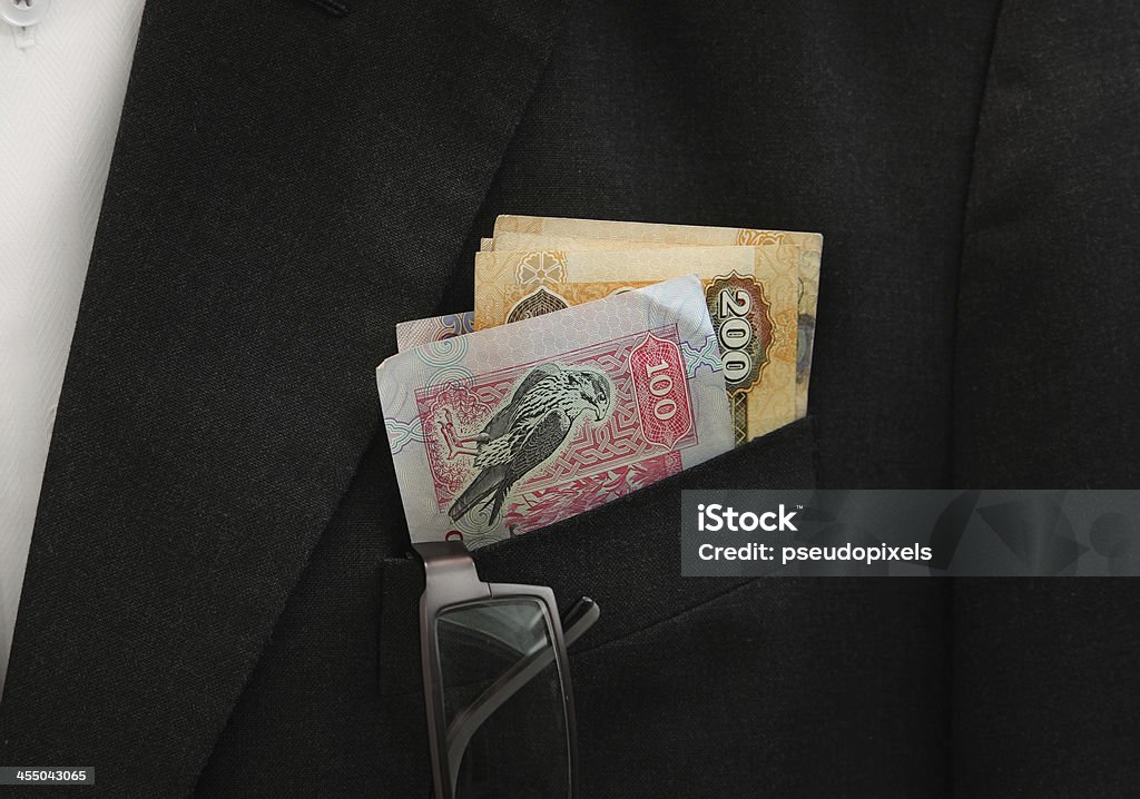 Banconota da Emirati Arabi Uniti-Dirham sulla tasca - Foto stock royalty-free di Affari