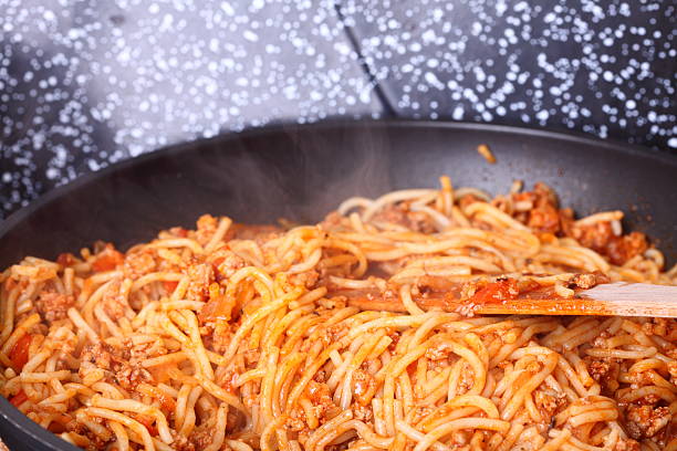 istock Boiling Spaghetti Pasta in a skillet 455043673