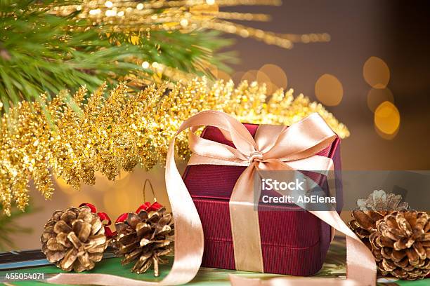 Elegant Gift Box On Defocused Lights Background Stock Photo - Download Image Now - At The Edge Of, Box - Container, Celebration