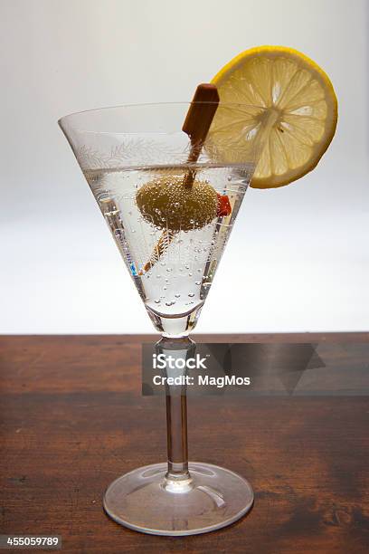 Drink With Olive In A High Glass Stock Photo - Download Image Now - Alcohol - Drink, Bar - Drink Establishment, Cocktail