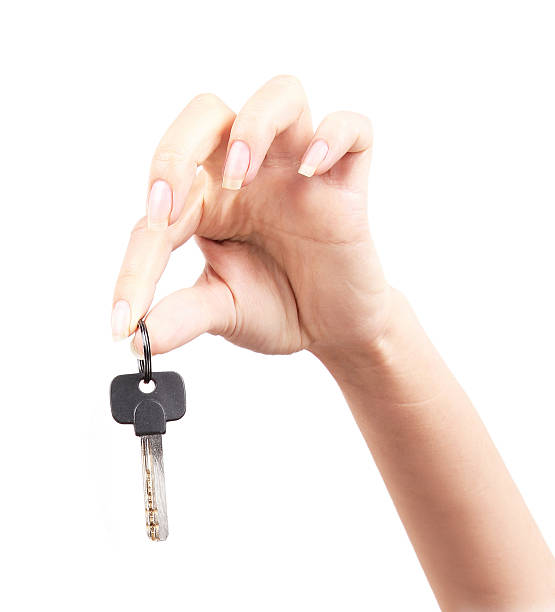 istock Woman with key 455066795