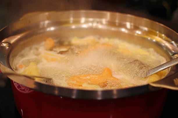 istock meat and vegetables in sukiyaki pot 455067297