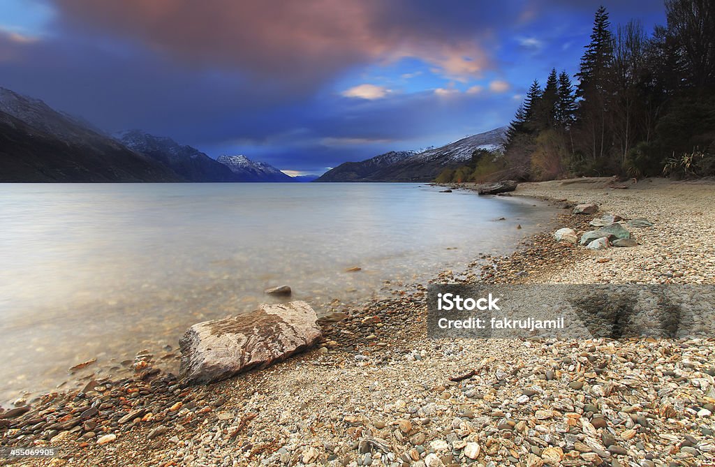 Lake Wakatipu, Queenstown, New Zealand Beautiful evening at Lake Wakatipu, Queenstown, South Island, New Zealand Dusk Stock Photo