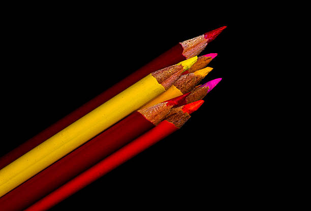 Pencils against black background stock photo