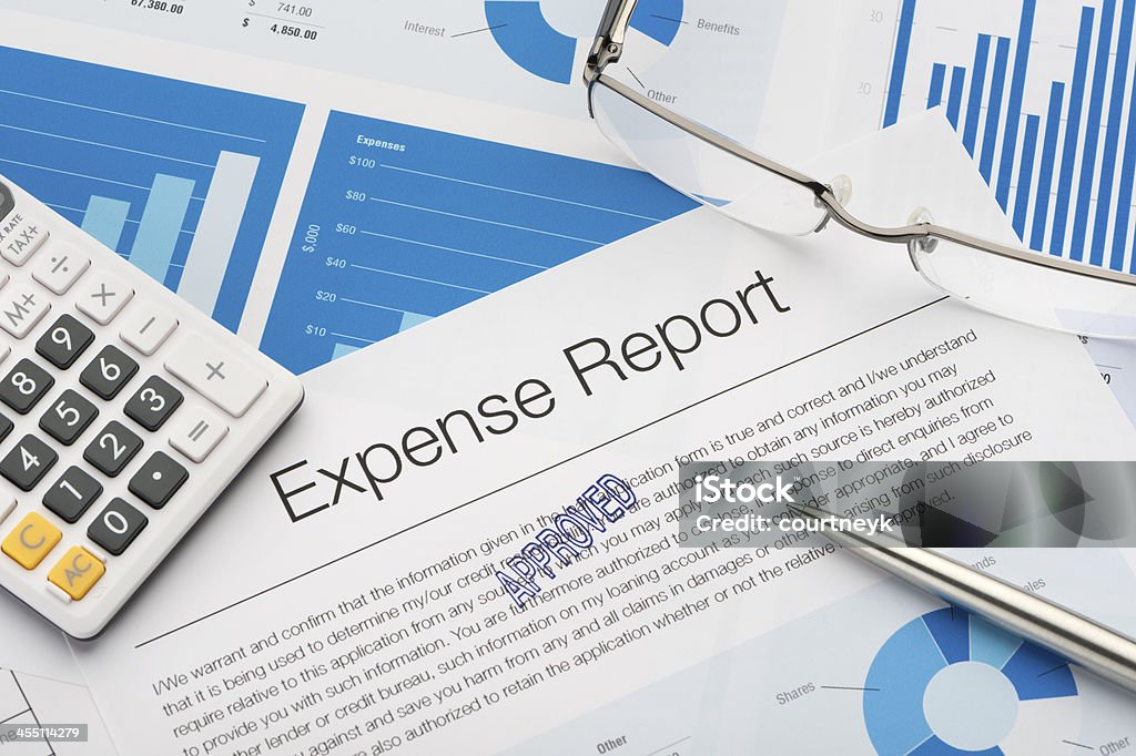 Approved expense report Approved expense report with paperwork Expense Stock Photo