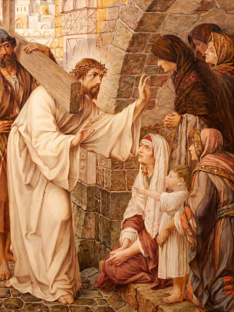 istock Gent - Jesus and crying women on the cross way. 455132101