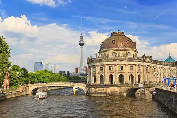 Bode Museum on museum island with Spree river and Alexanderplatz TV tower, Berlin, Germany