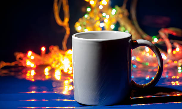 istock cup of tea and christmas garland 455158955