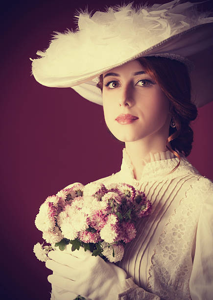 istock Beautiful redhead women with bouquet 455164219