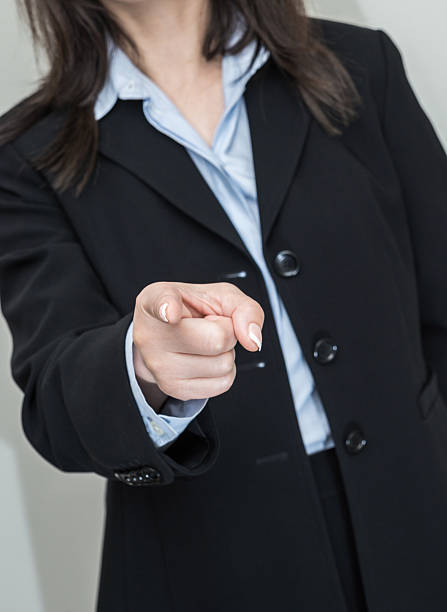 istock Woman pointing at you with one finger 455164601