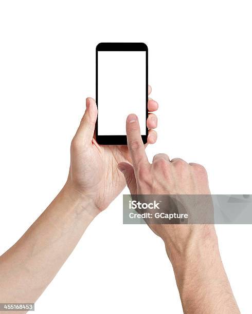 Man Holding Up Smartphone With One Finger On Screen Stock Photo - Download Image Now