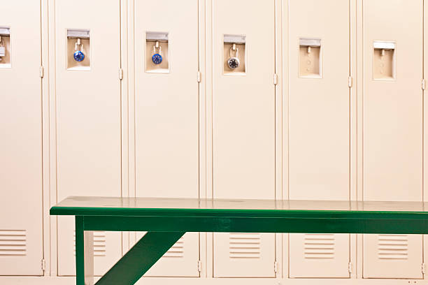 istock Sport: Empty bench in sports locker room. 455171849