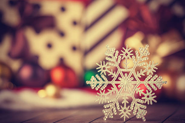 istock Snowflake and christmas gifts. 455180611