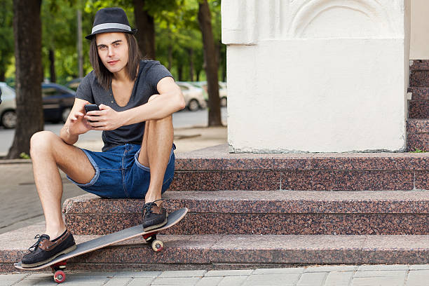 istock beautiful young people on the stone stairs 455189213