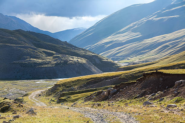 istock Majestic dirt road in Kirgizia 455198123
