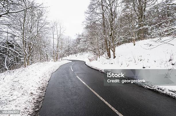 Winding Winter Road Stock Photo - Download Image Now - Asphalt, Country Road, Curve