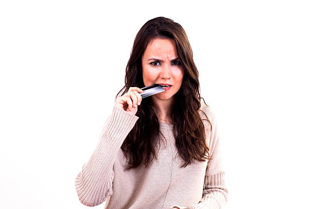 istock Young Woman with Credit Cards 455209013