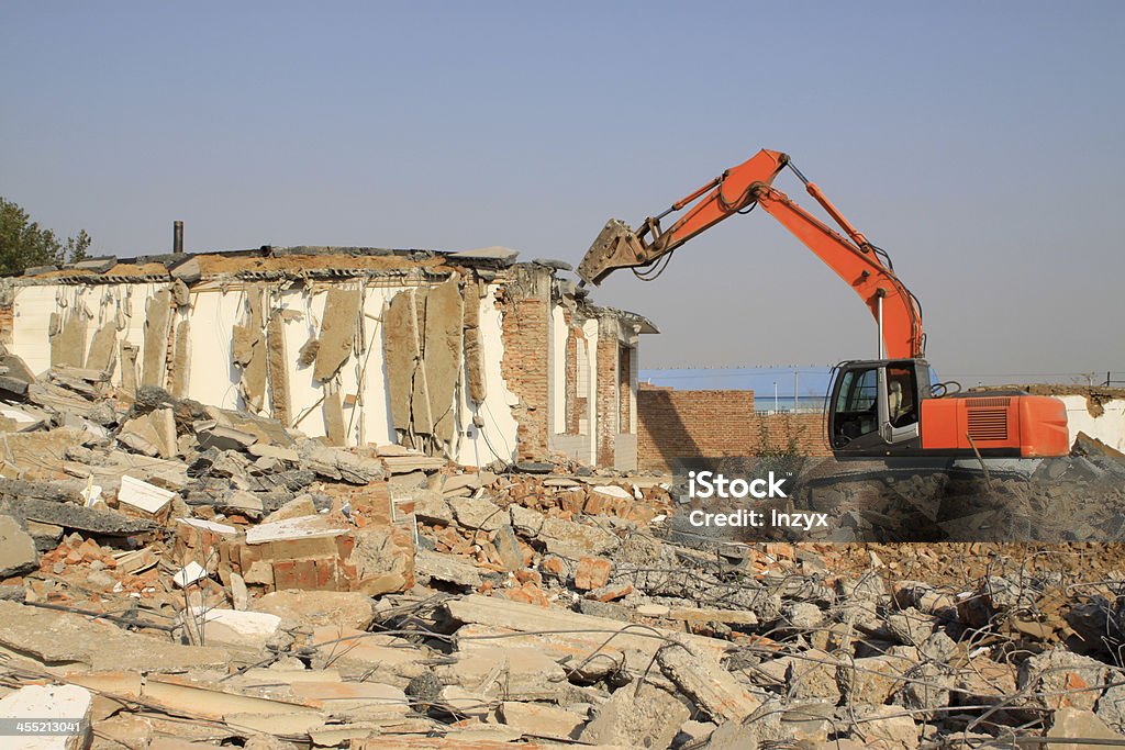 tractors are dismantling houses tractors are dismantling houses in china's rural Accidents and Disasters Stock Photo