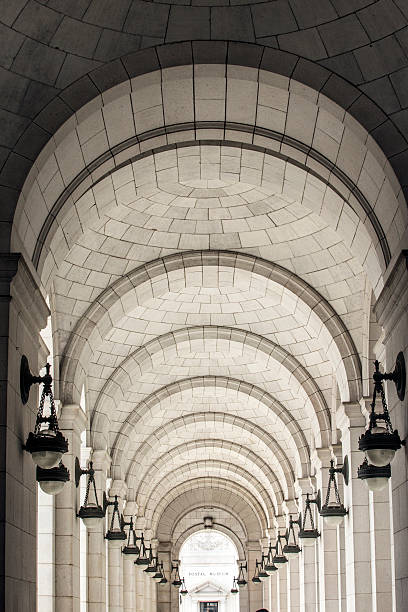 Round tower interior. Light from two windows illuminates the chalky vaults and spiral driveway inside the ancient Round Tower of Copenhagen