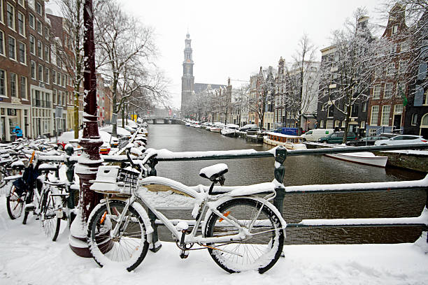 istock Amsterdam with the Westerkerk in winter Netherlands 455238763