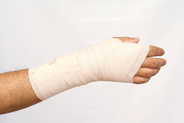 istock medicine bandage on injury hand 455239827