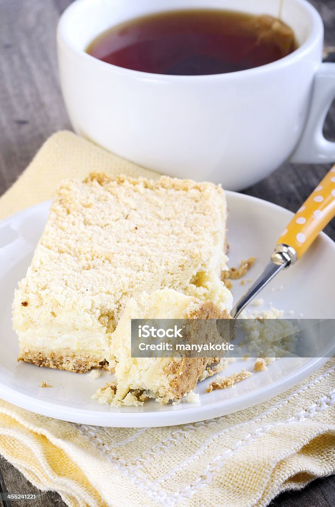 Crumb slices Crumb slices with ricotta and apple filling and tea Baked Stock Photo