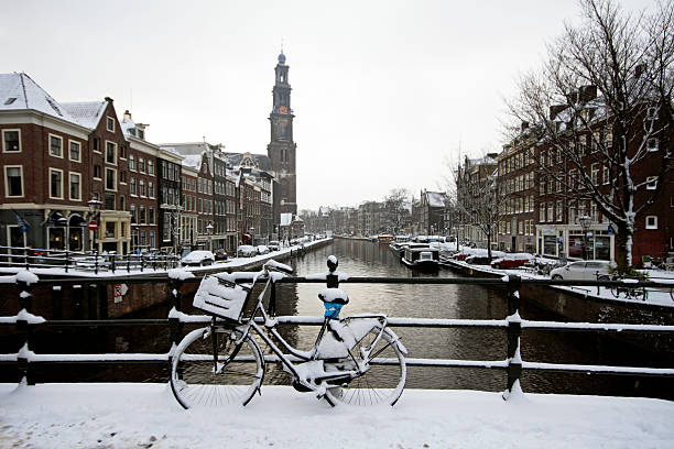istock Amsterdam with the Westerkerk in winter Netherlands 455241745