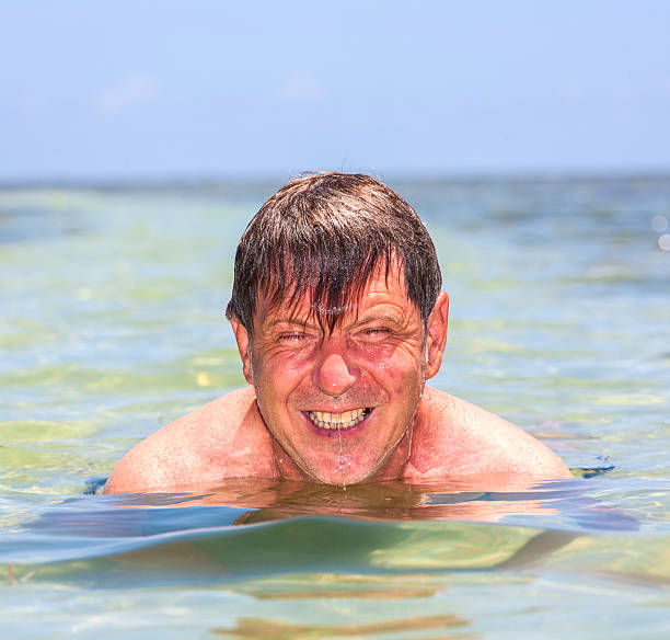istock swimming man in the ocean 455241959