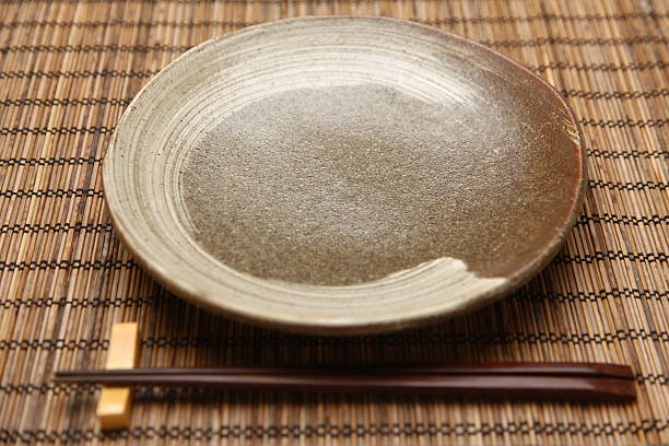 empty dish with chopsticks good for the background for composite photograph. serving dish stock pictures, royalty-free photos & images