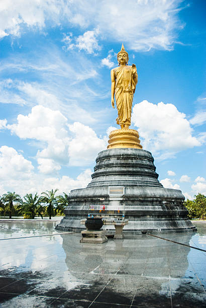 istock Big golden buddha statue with blue sky, Thailand 455247577