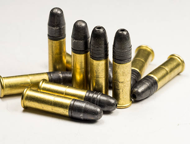 istock .22 caliber Long rifle Rimfire Ammunition on white 455247771