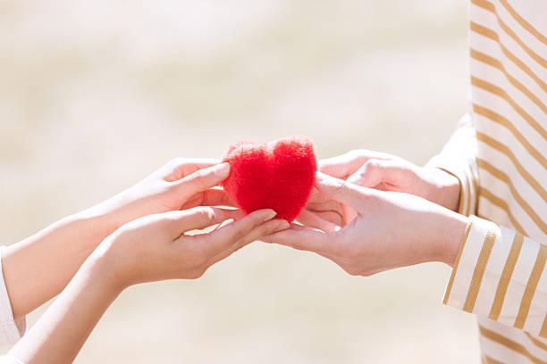 Gift of the heart Young men, have been present in the heart lover japanese boy and girl stock pictures, royalty-free photos & images