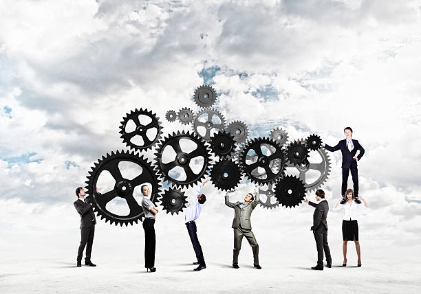 istock Illustration of business team with machine gears 455248601