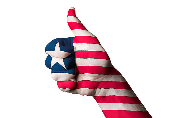 istock liberia national flag thumb up gesture for excellence 455250947