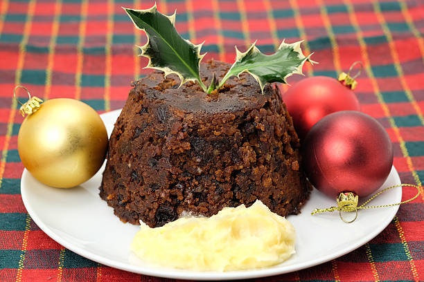 istock Christmas pudding with a sprig of holly 455252773