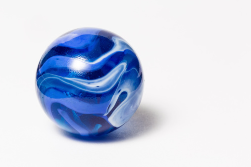 A blue, purple, and white swirl marble.