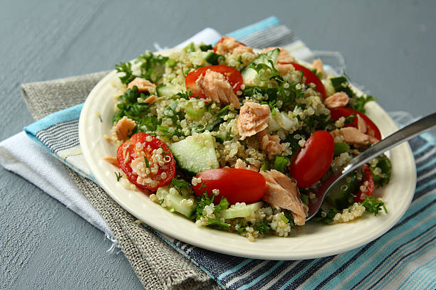 istock Tabbouleh salad with quinoa and salmon 455260275